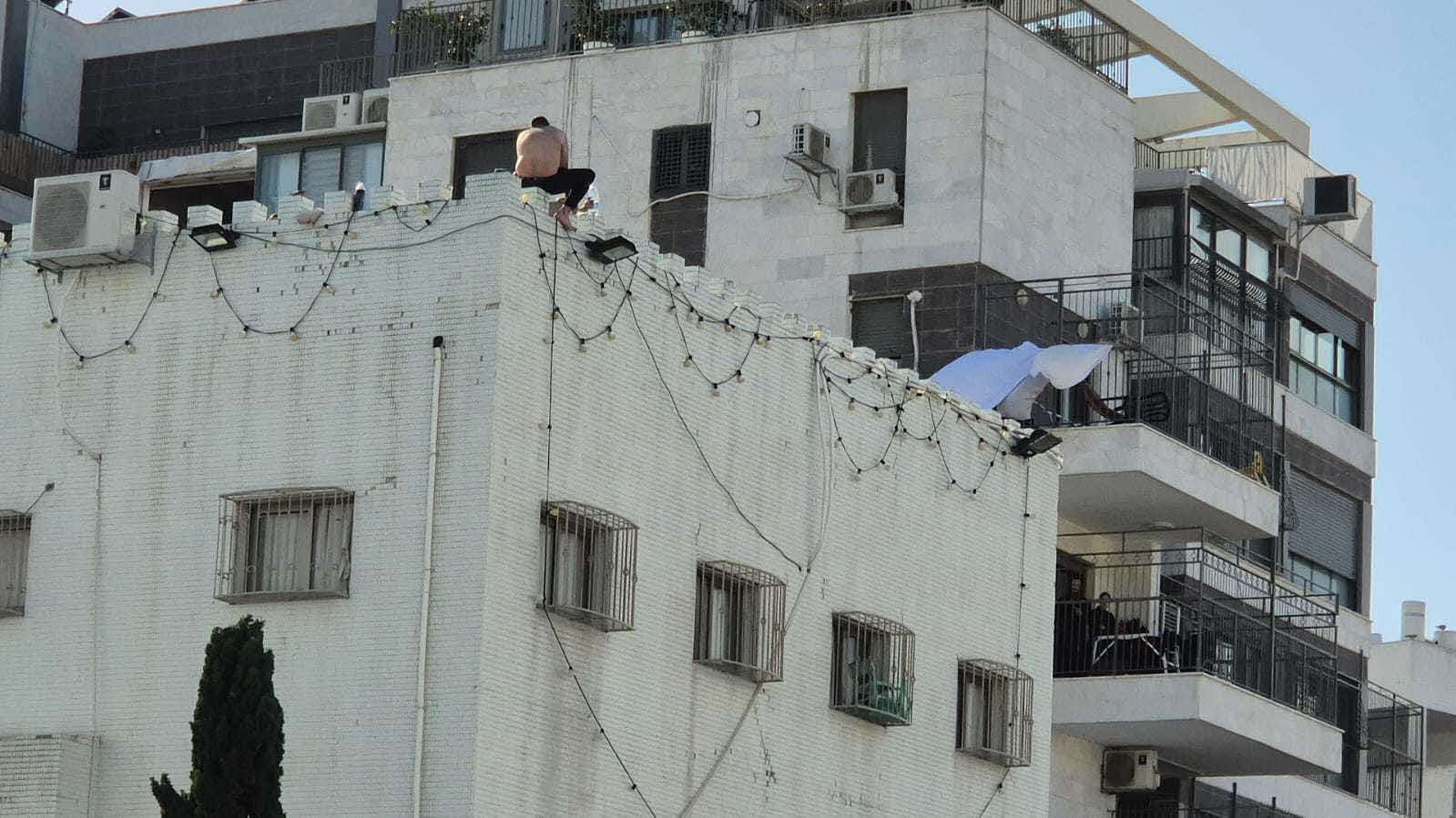 המרדף ברובע ז'. המצלם