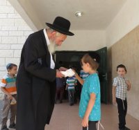 הרב וייספיש זל. המצלם